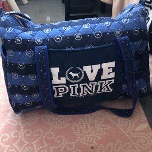 The brand pink duffel bag